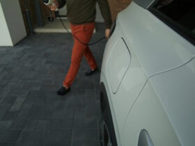 Charging-an-electric-car-with-an-extension-lead