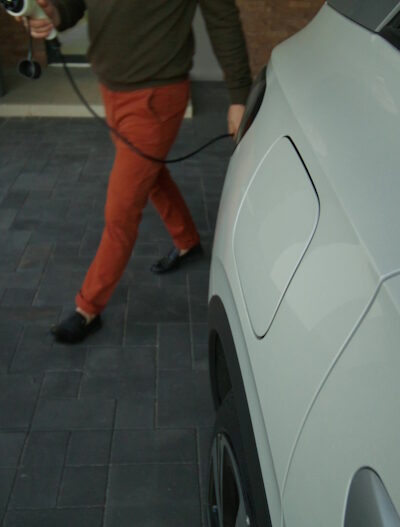 Charging-an-electric-car-with-an-extension-lead