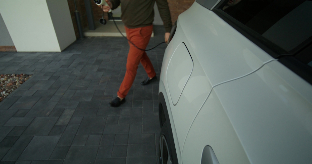 Charging-an-electric-car-with-an-extension-lead