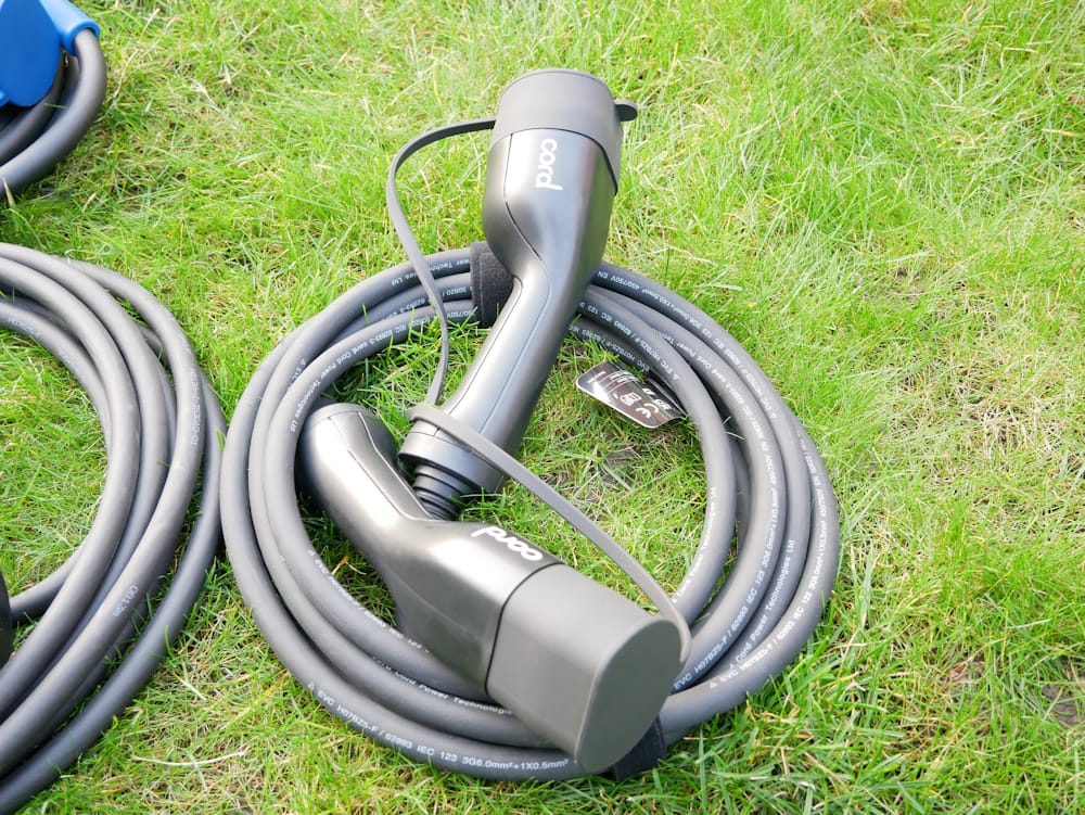 The Cord Type 2 cable, shown on the floor coiled up