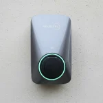 Project charger - the Apex EV charger installed on a concrete wall outside