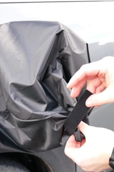 Charging port cover to protect